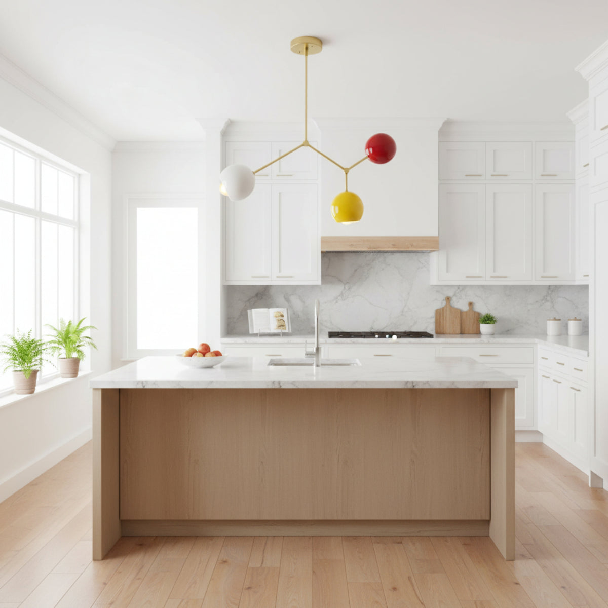 Zurich 3 light brass branch chandelier shown from an angled view with white, yellow and red globe shades.