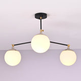 Angled perspective of modern 3-light flushmount chandelier with opal glass globes