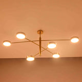 Architectural disc ceiling light fixture with six circular lamps and wide 60 inch linear layout