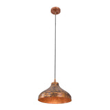 Artistic dome pendant light installed over a dining table, creating a cozy warm glow for elegant interiors