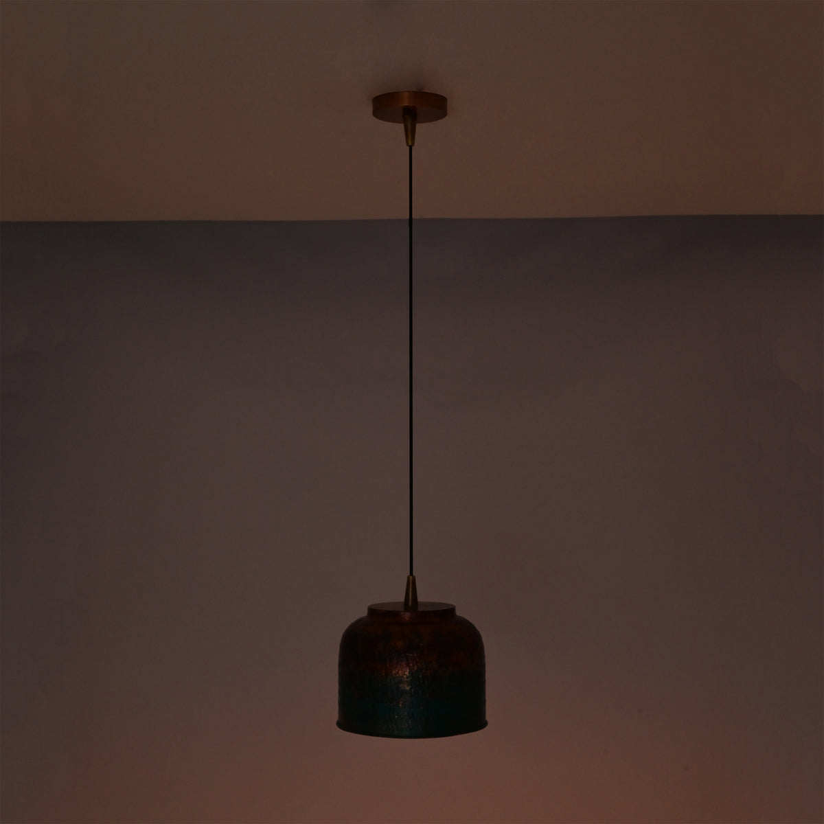 Artistic finish ceiling pendant light with black cord, copper canopy, and multicolor rounded shade design
