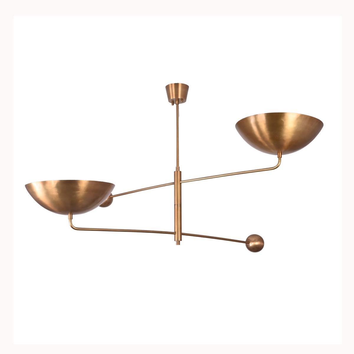Asymmetrical brass ceiling chandelier with sculptural arms, bowl shades, and warm reflected ceiling light