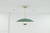 Illuminated Athens verdigris chandelier with three LED lights creating a warm ambient glow beneath the dome