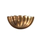 Aurora modern brass fluted half bowl wall sconce featuring a sculptural ribbed design with a warm satin brass finish.