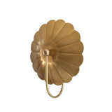 Angled front view of the Aurora floral brass wall sconce showcasing its sculptural floral backplate and gracefully curved wall-mounted arm.