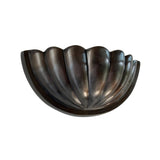 Front perspective of the Aurora modern gunmetal fluted half bowl wall sconce featuring a sculptural ribbed design with a sophisticated gunmetal finish