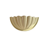 Front detail of the Aurora modern ivory fluted half bowl wall sconce highlighting the handcrafted ribbed texture and smooth ivory finish.