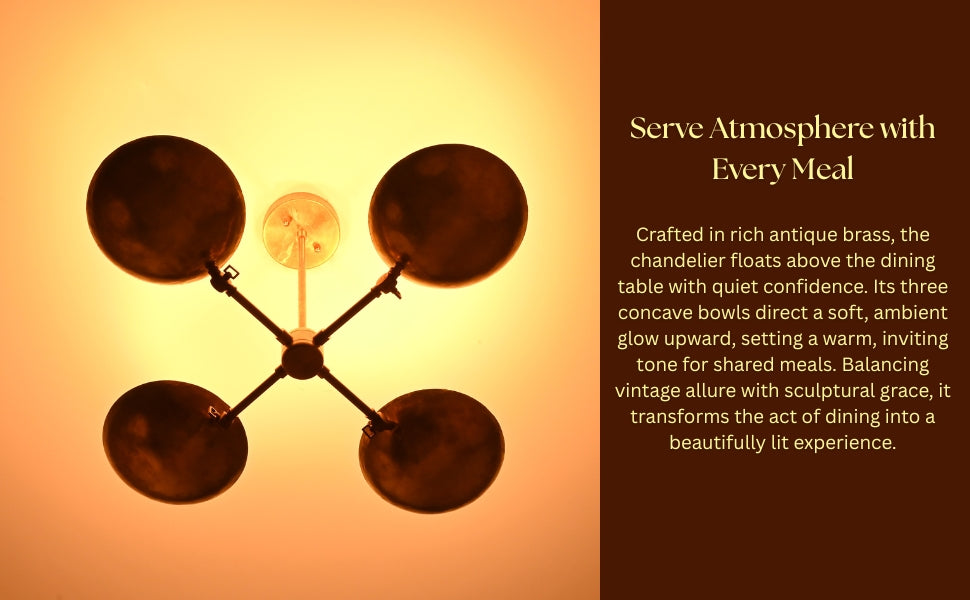 Ambient brass chandelier above bed in nighttime setting, offering soft illumination for cozy interiors