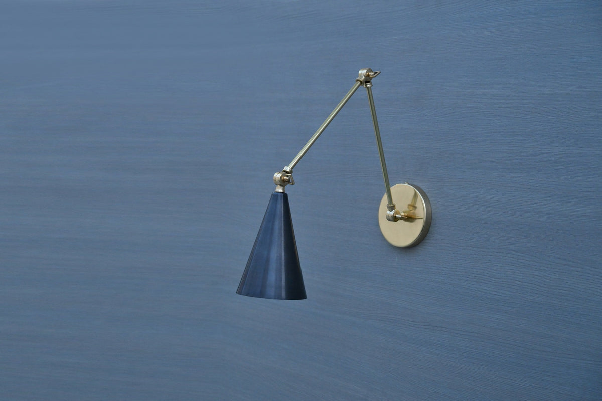 Handmade brass swing arm wall light with black cone shade, industrial design