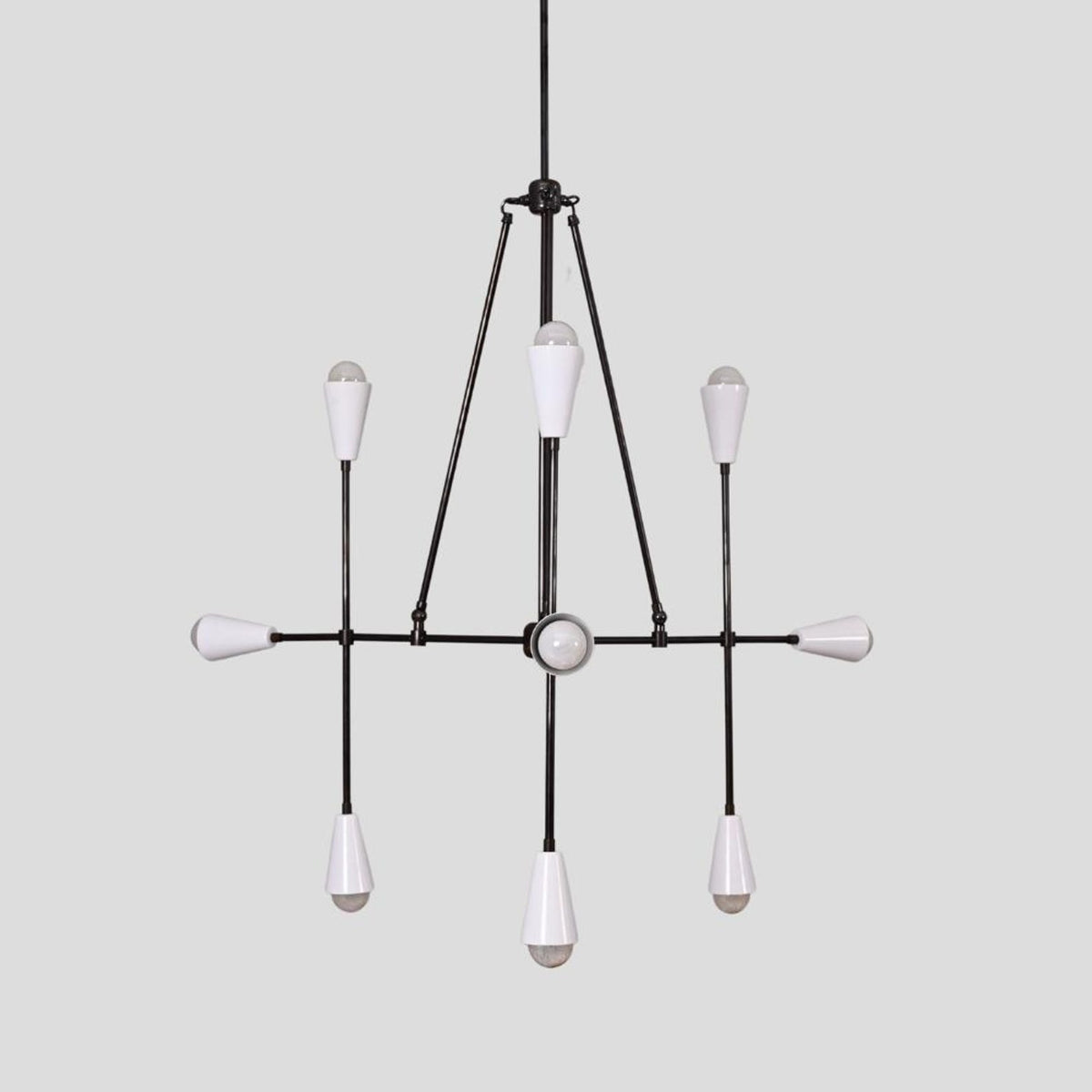 Handcrafted black brass chandelier with eight cone shades, geometric frame and modern minimalist style.