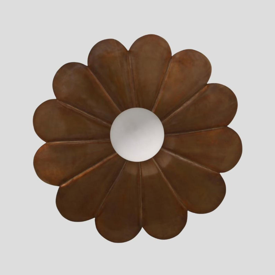 Bloom disc brass chandelier with sculpted petal shades and frosted globe diffuser, handcrafted by Brass Leaf Studio for warm ambient ceiling lighting.