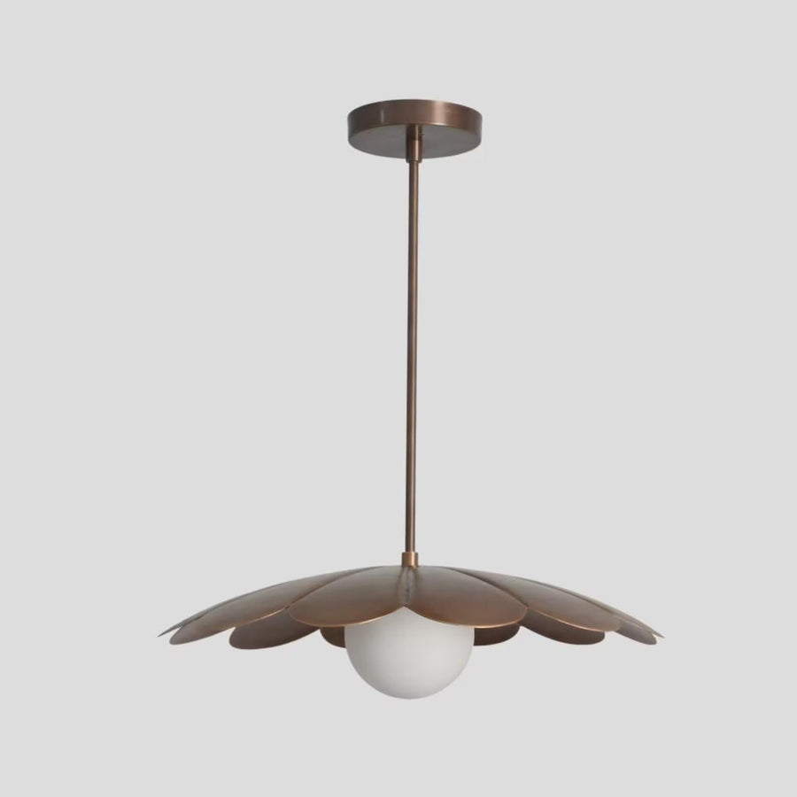 Bloom disc brass chandelier with sculpted petal shades and frosted globe diffuser, handcrafted by Brass Leaf Studio for warm ambient ceiling lighting.