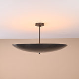 Handmade 5-light semi-flushmount brass chandelier viewed from an angle