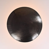 Close-up of solid brass bowl ceiling light showcasing smooth satin finish