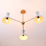 Angled view of modern 3-arm brass chandelier with white bowl shades and central downrod.