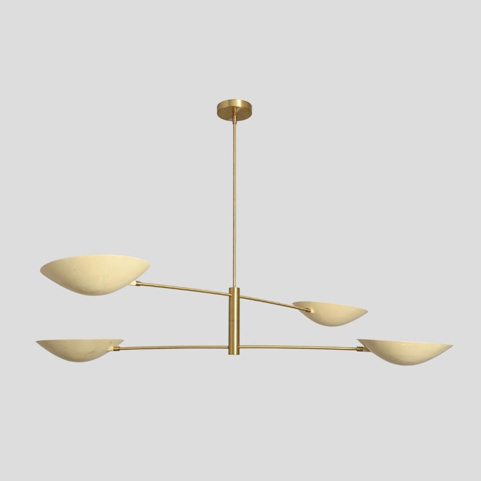 Elegant handmade brass chandelier with four bowl shades, modern ceiling fixture with adjustable drop rod – stylish angle.
