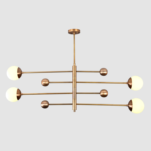 Front view of handcrafted solid brass 4-light chandelier with opal globes in sleek linear arrangement.