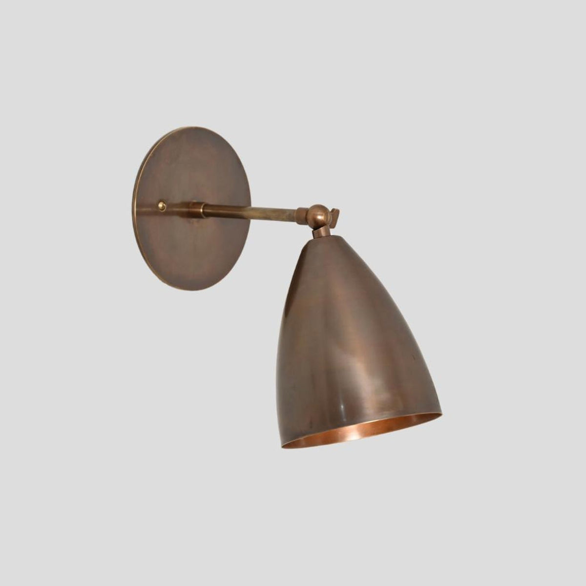 Elegant brass wall light with adjustable cone shade – handmade modern sconce for cafes, boutiques, and bedrooms
