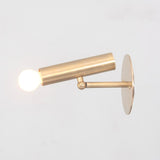 Brass wall spotlight with extended cylindrical body and glowing bulb, mounted on brass base