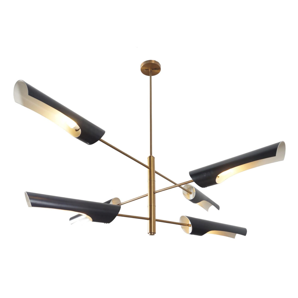 Top angle view of modern six-light brass chandelier with black trumpet shades providing ambient lighting.