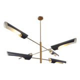 Top angle view of modern six-light brass chandelier with black trumpet shades providing ambient lighting.
