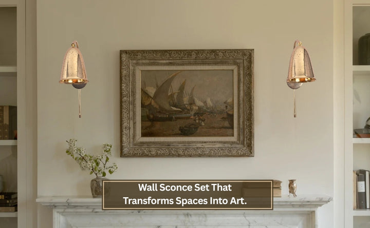 Brass bell wall sconces styled in a classic living room interior beside framed artwork above fireplace