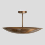 Front view of handmade brass bowl chandelier – wide dome pendant with sleek minimalist design