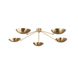 Front view of brass bowl flushmount ceiling light featuring sculptural arms and balanced modern design.