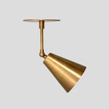 Side view of adjustable brass cone shade ceiling light fixture for modern interiors