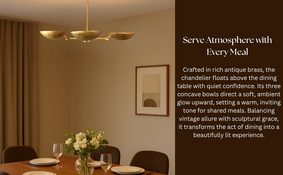 Daylit view of 4-light brass pendant chandelier showing raw textured finish and modern balance