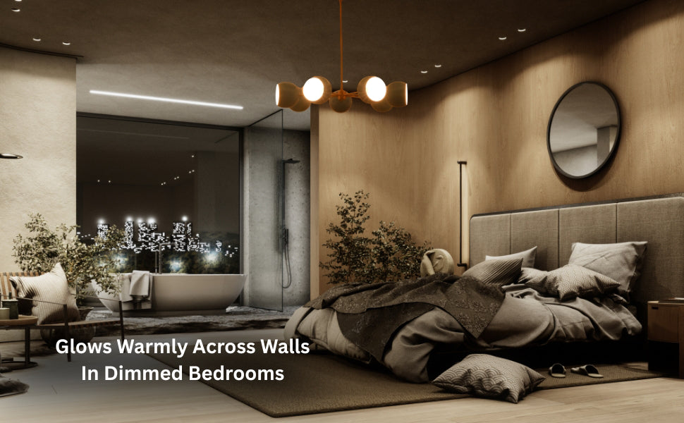 Modern brass chandelier with blue globe shades styled in a coastal-inspired living room.