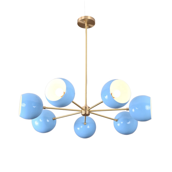 Modern chandelier with blue glass shades and gold metal accents on a white background