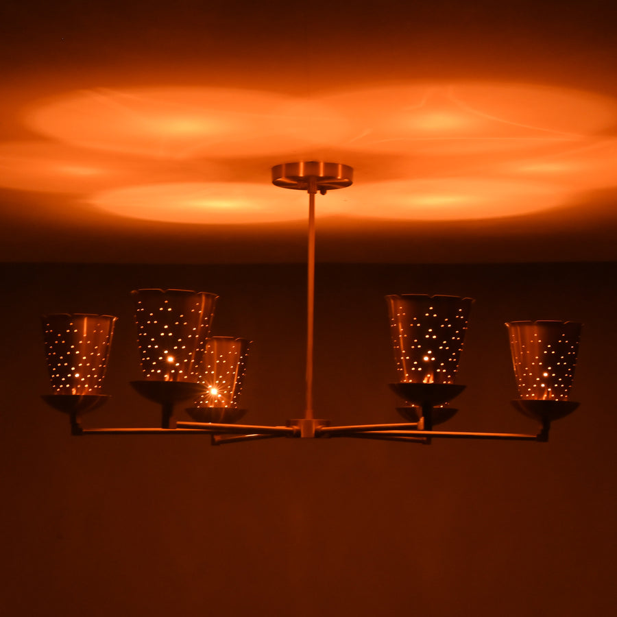 Front view of 6 light brass cone shade chandelier with sculpted arms and brushed brass finish, handcrafted by Brass Leaf Studio for warm ambient lighting.