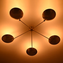 Side View of Brass Flush Mount Chandelier with Ambient Glow