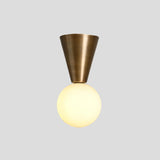 Handmade brass cone flush mount ceiling light with glowing opal glass globe – modern minimalist lighting fixture