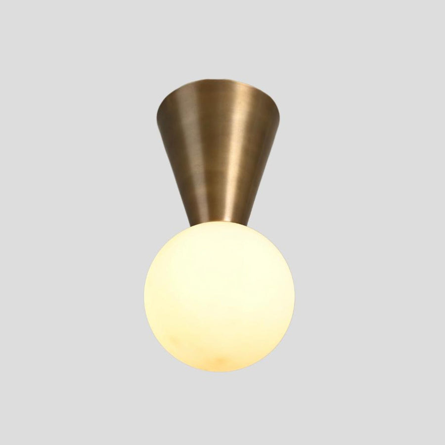 Handmade brass cone flush mount ceiling light with glowing opal glass globe – modern minimalist lighting fixture