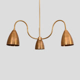 Straight view of brass 3-light chandelier with cone shades and minimalist industrial design, crafted by Brass Leaf Studio.
