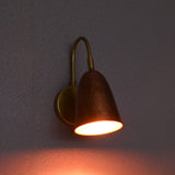 Brass and hammered copper wall sconce illuminated – modern handcrafted lighting fixture