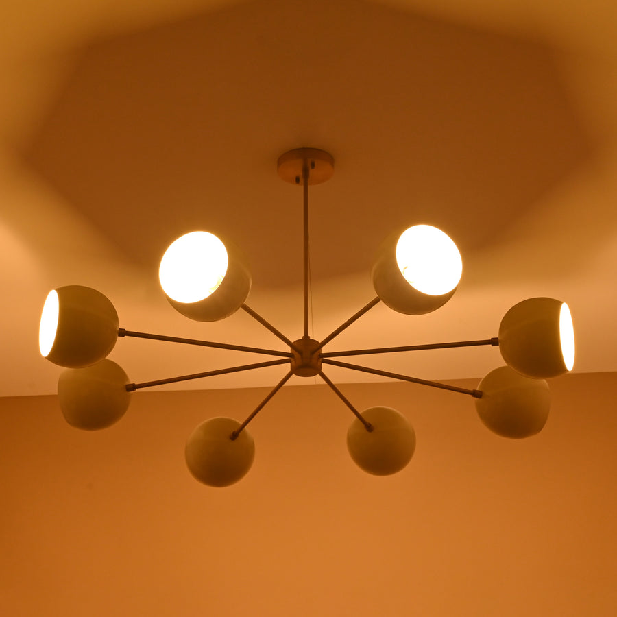 8-light modern brass chandelier with cream dome shades, handcrafted ceiling light by Brass Leaf Studio