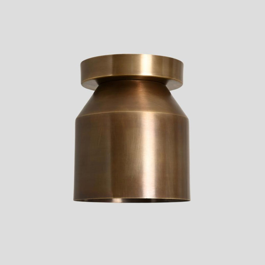 Handmade brass cylinder flush mount ceiling light with minimalist industrial design
