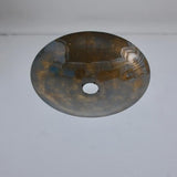 Bottom view of handcrafted brass disc ceiling light showing smooth bowl shape and subtle surface detailing for warm ambient illumination.