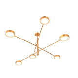 Brass disc chandelier on white background showing six circular light heads and architectural rod structure