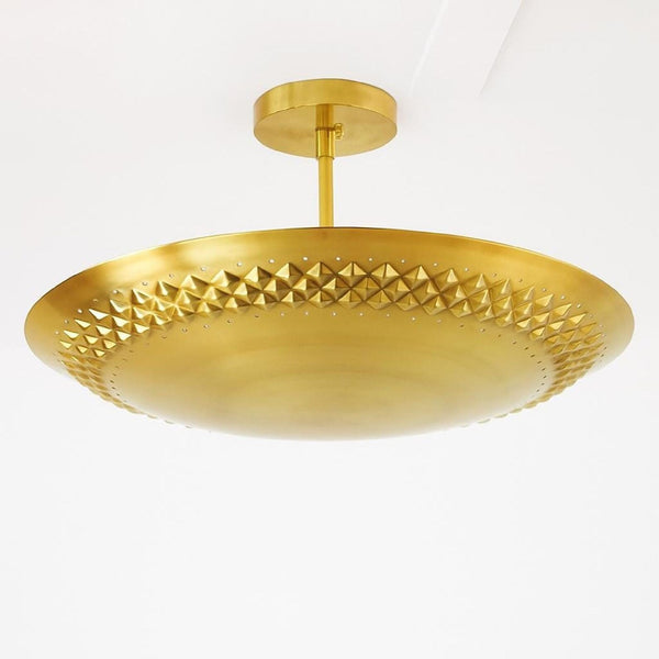 24 inch solid brass disc flush mount ceiling light with geometric textured detailing and brushed brass finish by Brass Leaf Studio