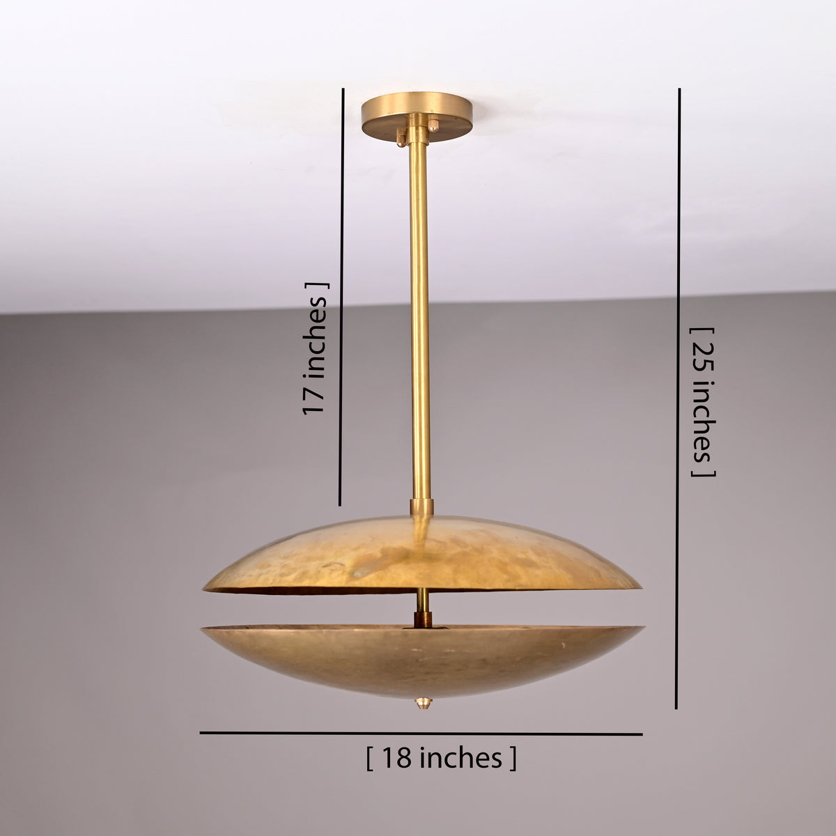 18-inch brass disc pendant light with 25-inch height and 17-inch rod drop, shown with labeled measurements for accurate sizing reference.
