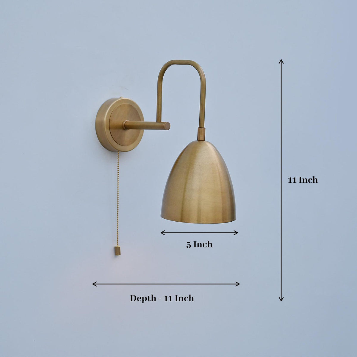 Dimensional image of brass dome wall light showing 11-inch height, 5-inch width, and 11-inch depth for accurate sizing reference.