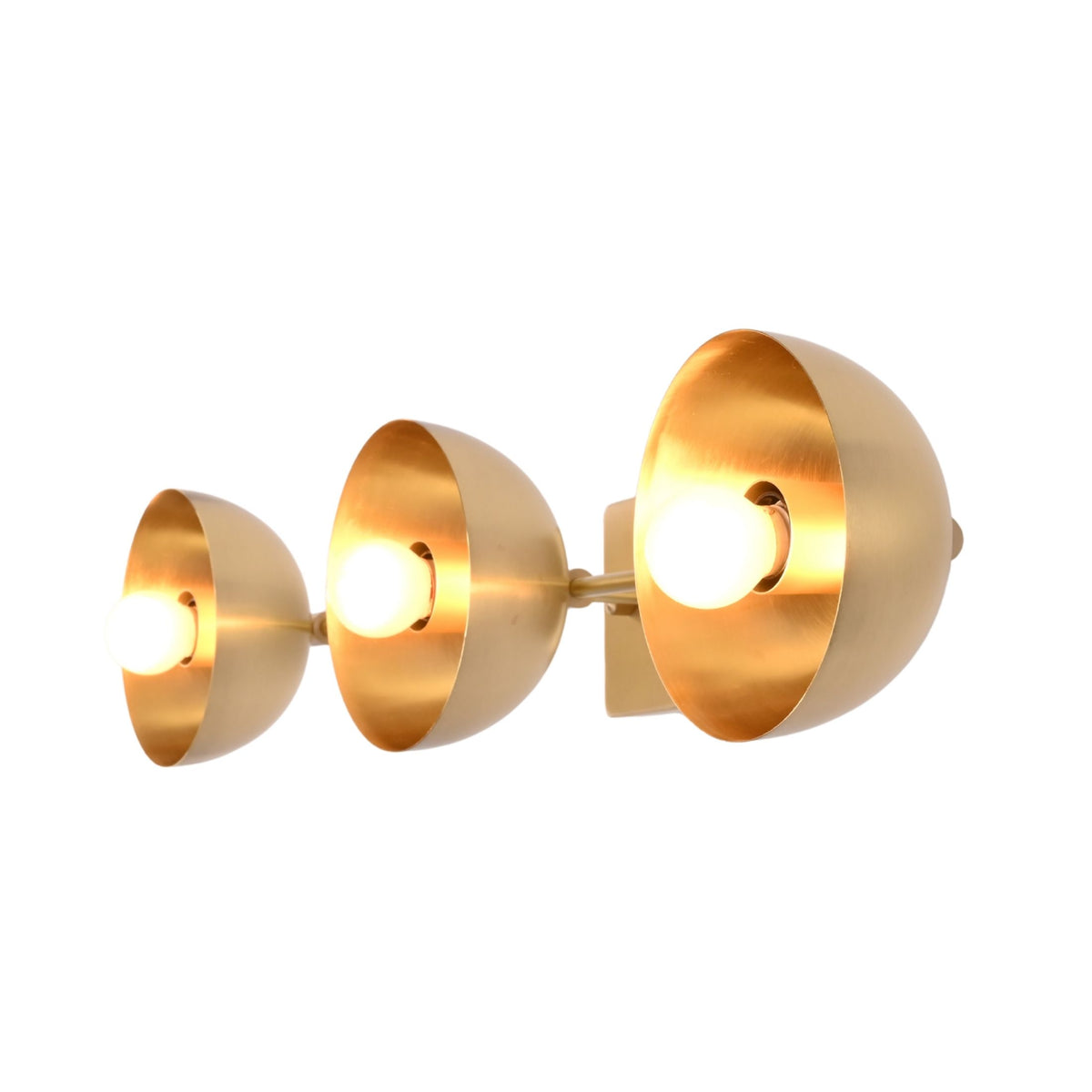Brass dome wall sconce shown illuminated with warm glow, ideal for modern bathroom and mirror lighting
