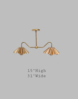 Brass double arm chandelier with wavy shades, 31 inches wide and 15 inches high