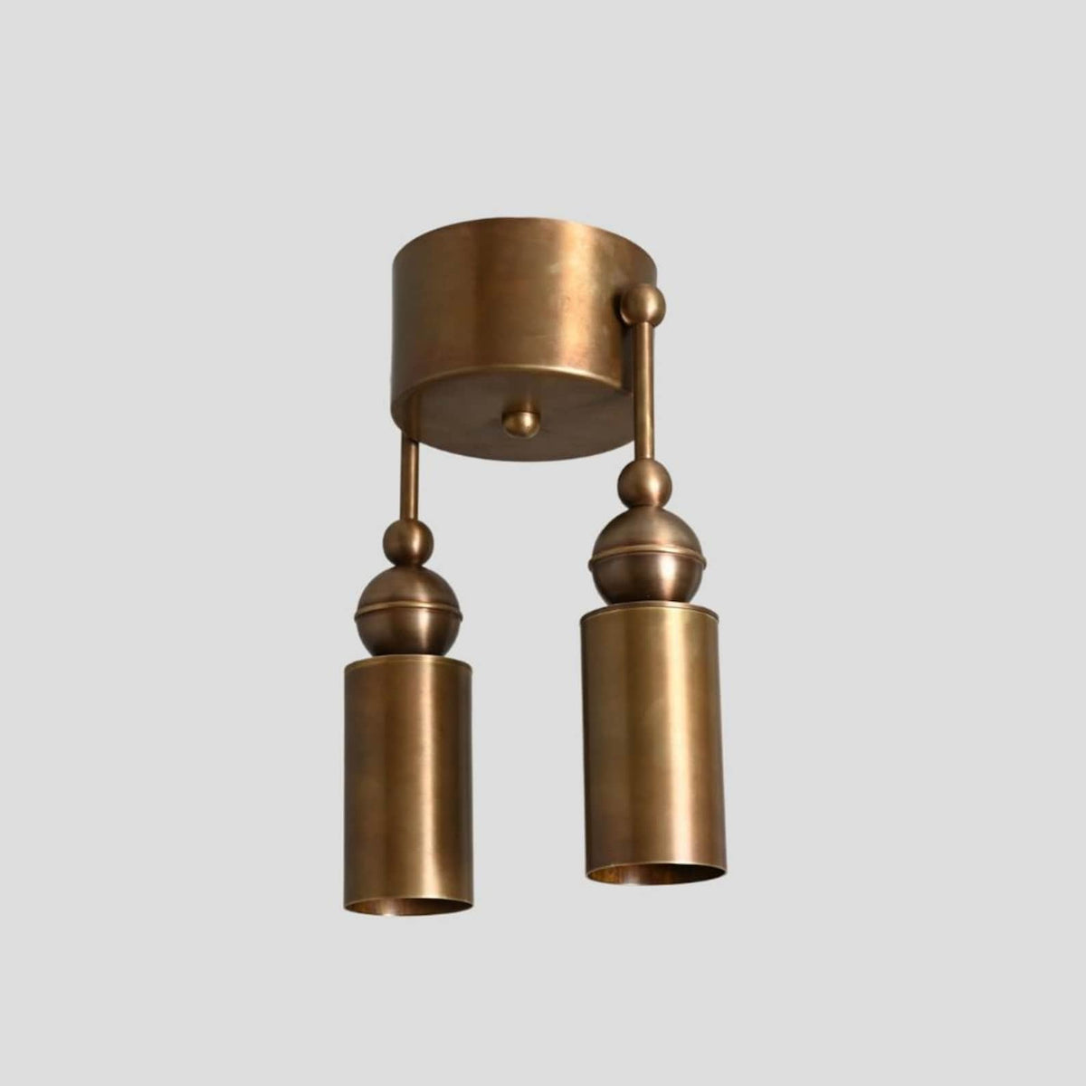 Modern handmade brass double cylinder ceiling light, left-side angle view showcasing premium brass finish