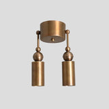 Brass double cylinder ceiling flushmount light, straight front view highlighting sleek handcrafted design