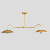 Close-up of brass double dome chandelier – handcrafted ceiling light with solid brass construction and lacquered brushed finish